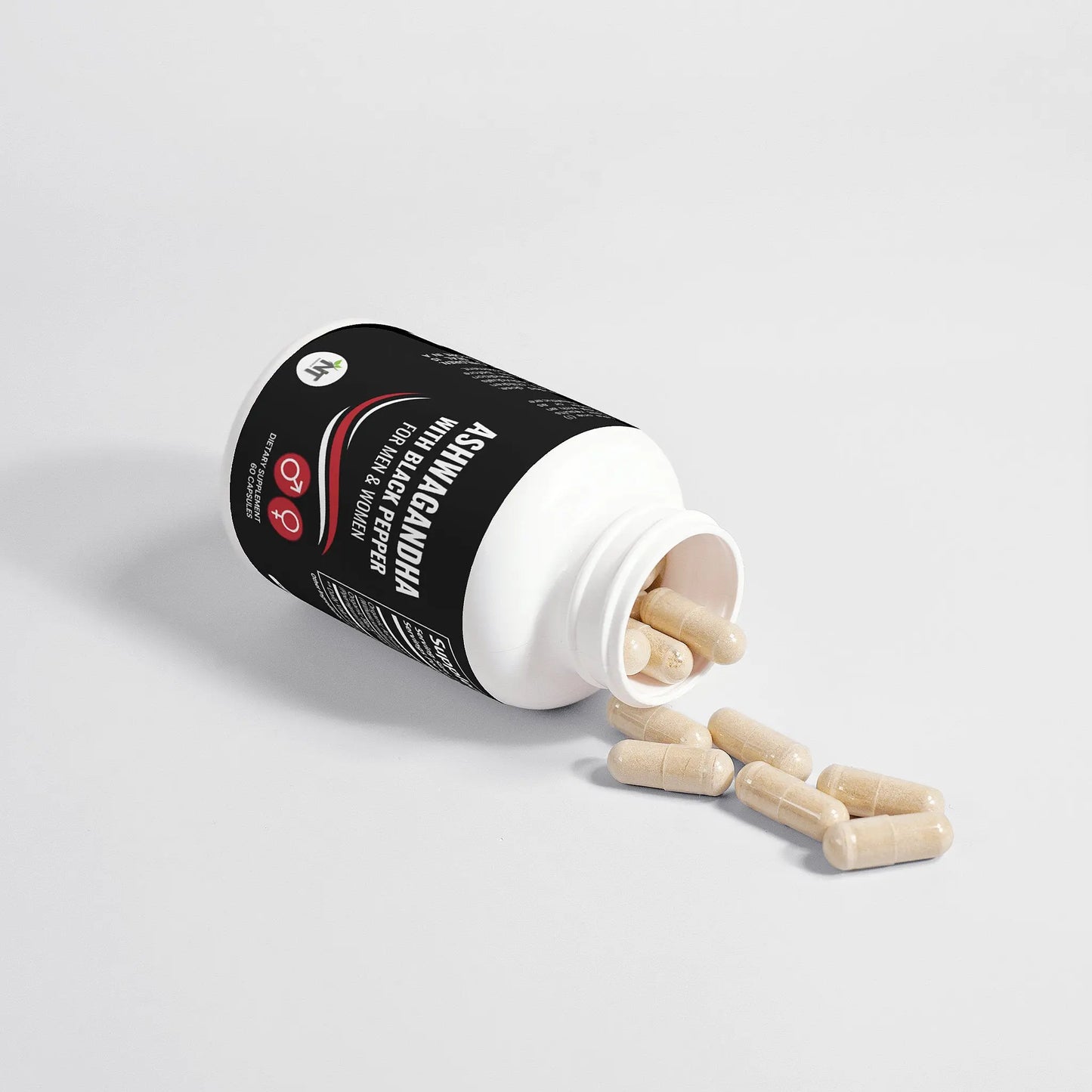 Ashwagandha Capsules bottle tipped over with capsules spilling out – Nutrition Tribune